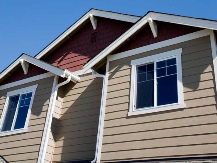 How much to replace vinyl siding with brick